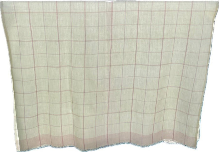 Pink and cream check sarong with fringe over glass pool fence - ANNIE.G