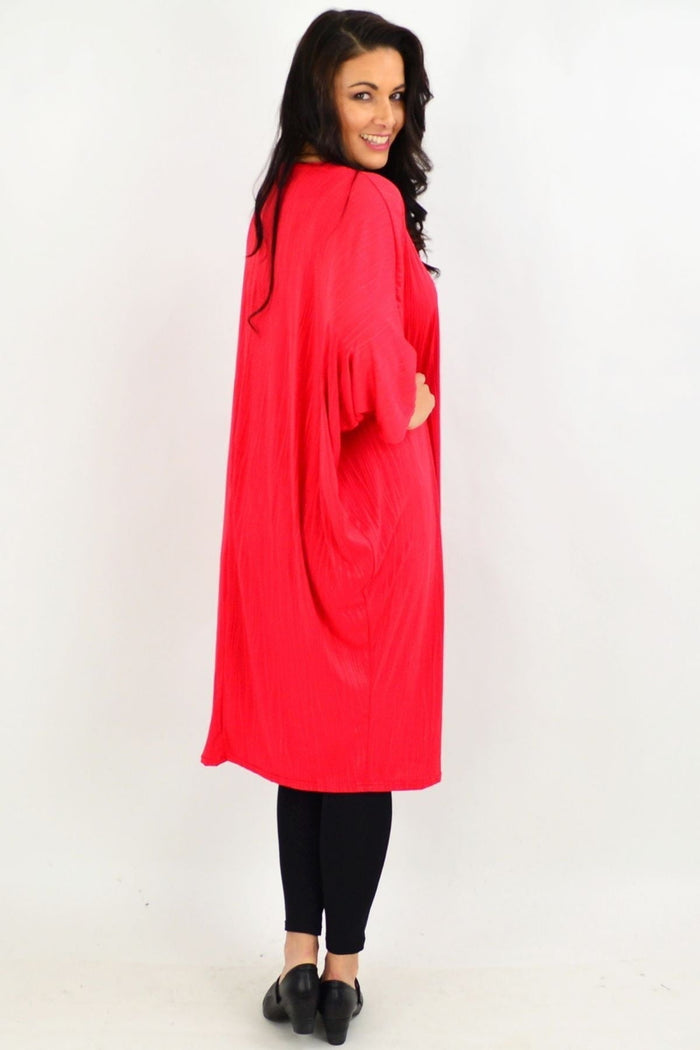 Red ribbed oversized tunic dress by Lilia Whispers, loose fit, casual style, long sleeves, and relaxed silhouette.