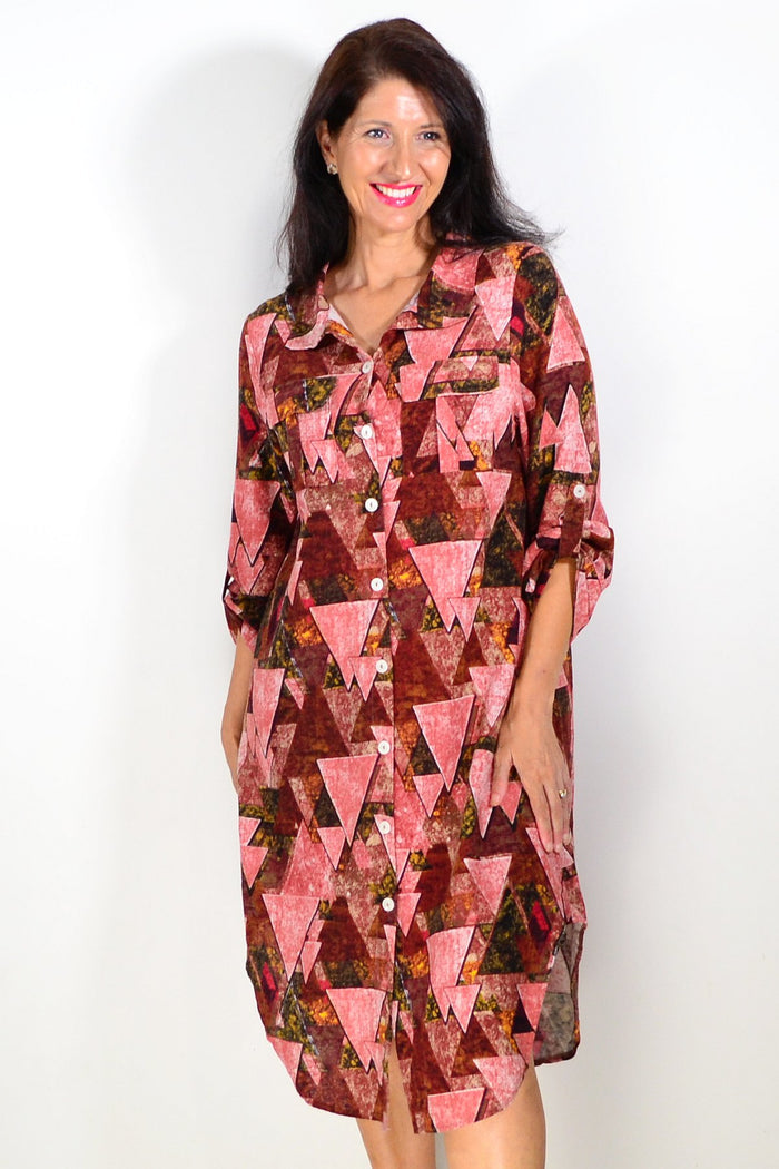 Pink printed ladies long tunic shirt by Wishstone, featuring a comfortable fit and stylish design, shown on a model.