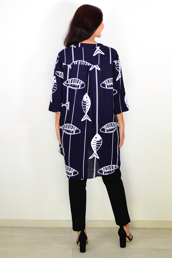 Navy hi-low relaxed tunic shirt by Ruby Rain, shown on a hanger with front and back views, lightweight and casual style.