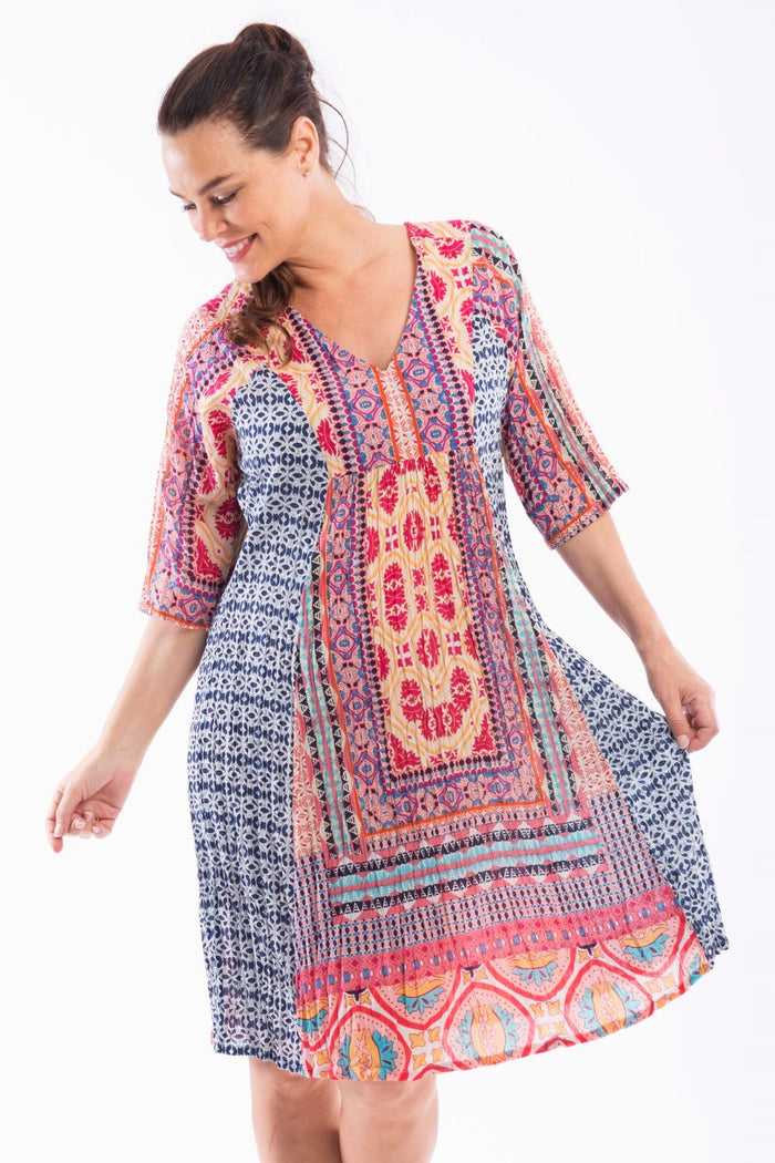 I Love Tunics Olympia Print tunic dress featuring vibrant geometric patterns and a relaxed fit, perfect for casual wear.