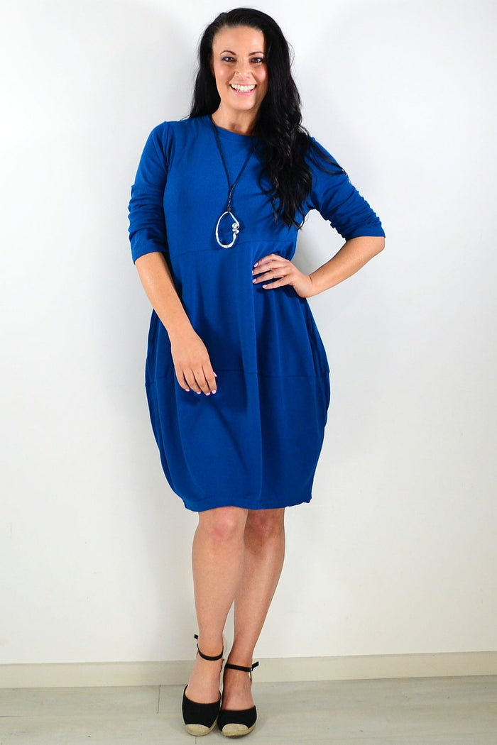 Teal cocoon winter pocket tunic dress by Peony, featuring a relaxed fit, cozy fabric, and functional pockets.