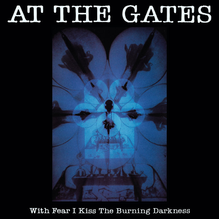 Album cover for With Fear I Kiss The Burning Darkness by At The Gates features a dark, abstract blue-toned design with symmetrical shapes, a central silhouette, and bold white text displaying the band and album title. Brand: At The Gates.