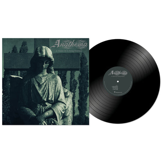 A black ANATHEMA vinyl rests by its album cover, featuring a stone angel statue in dim light. The text says ANATHEMA: A Vision of a Dying Embrace—a must-have for fans of Doom Metal and live Krakow 1996 collectors.