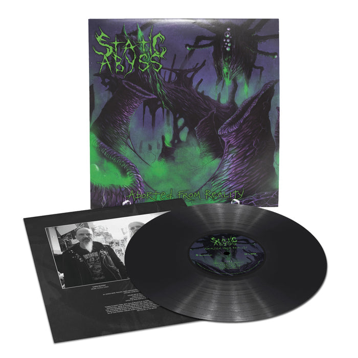 Static Abyss black vinyl record, "Aborted From Reality," features a dark purple-green monster cover in classic U.S. death metal style, and includes an insert with black-and-white band photos and text.