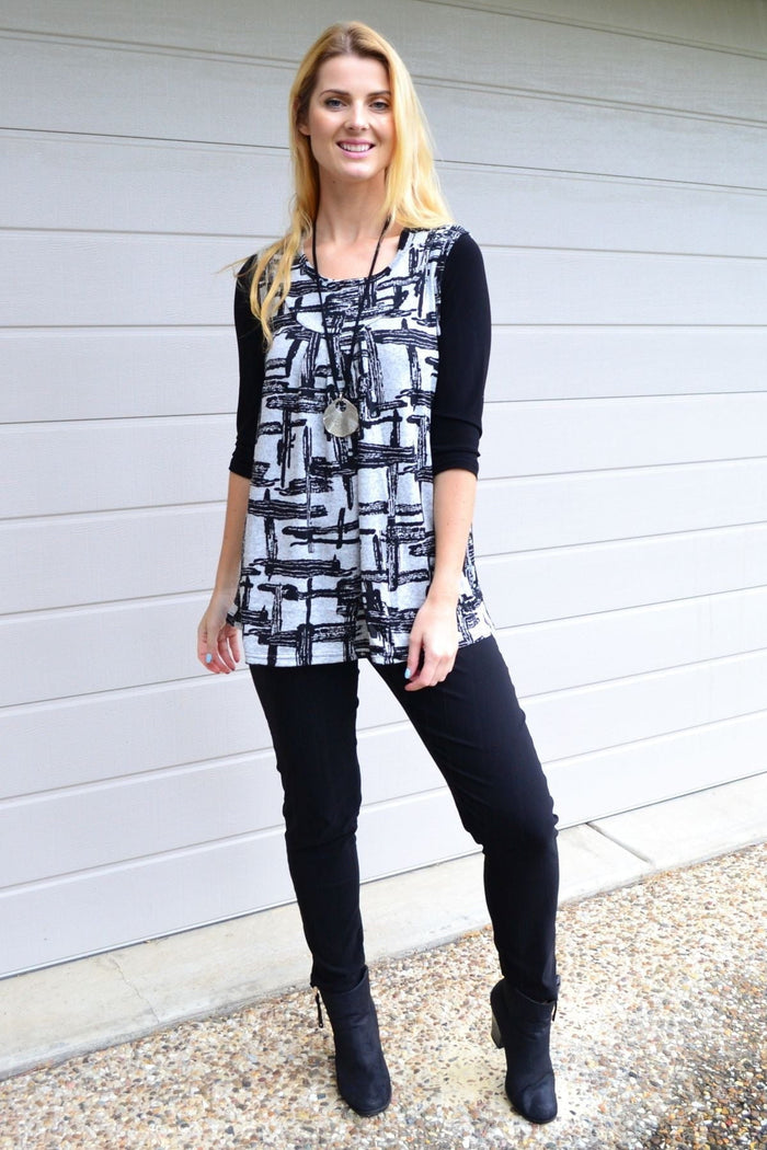 Abstract sleeveless fleece tunic top by Lilia Whispers, shown in a cozy, soft fabric with a modern, artistic design.