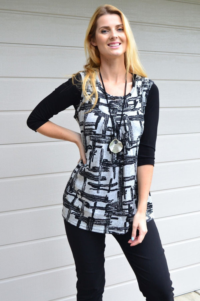 Abstract sleeveless fleece tunic top by Lilia Whispers, showcasing a cozy, stylish design with a modern silhouette.