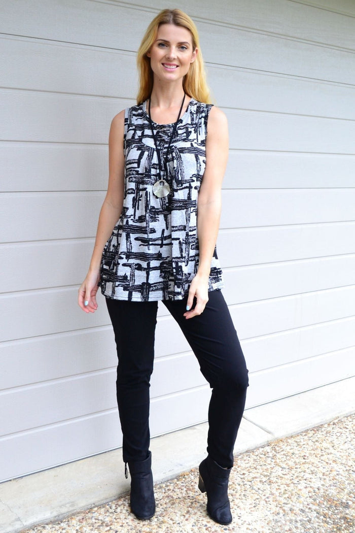 Abstract sleeveless fleece tunic top by Lilia Whispers, featuring a cozy fleece fabric and modern sleeveless design.