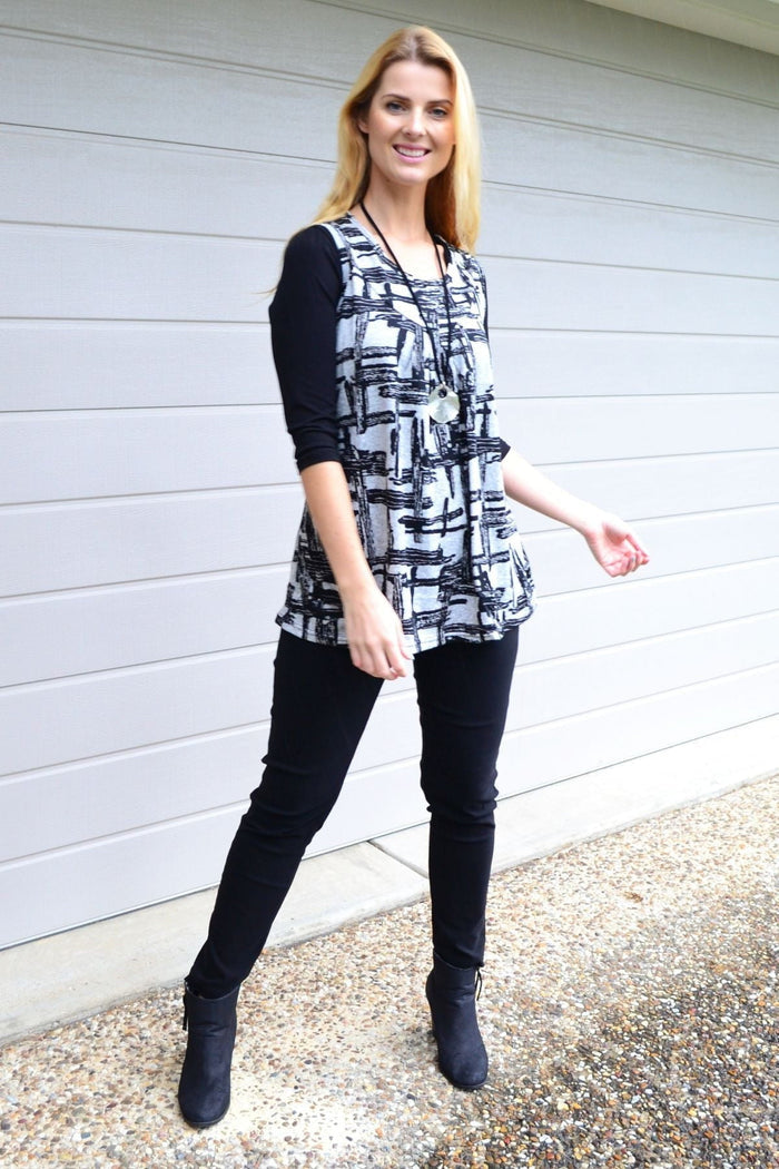 Abstract sleeveless fleece tunic top by Lilia Whispers, shown in soft fleece fabric with a relaxed fit and sleeveless design.