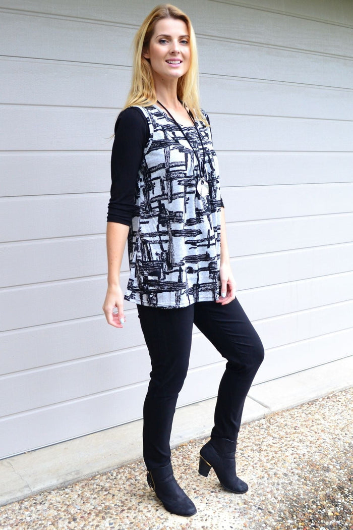 Abstract sleeveless fleece tunic top by Lilia Whispers, featuring a cozy fleece fabric and a modern sleeveless design.