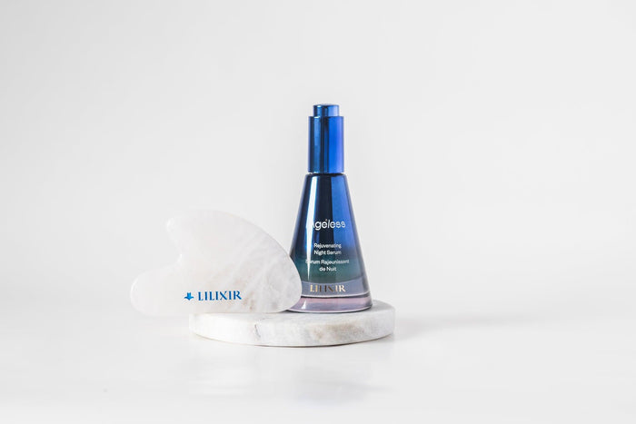 LILIXIR Ageless Rejuvenating Night Serum and white crystal gua sha stone