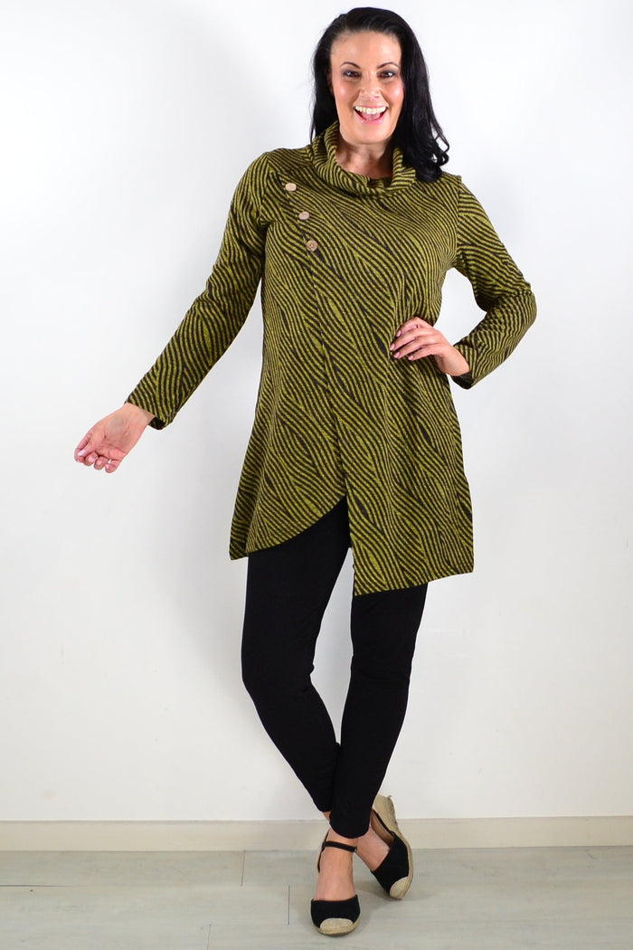 Whispers animal stripes crossover tunic top with long sleeves and relaxed fit, featuring bold black and white stripe pattern.