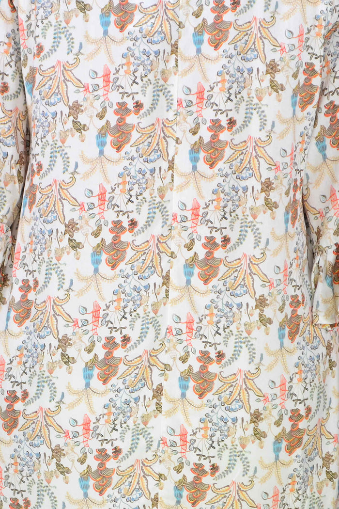 Wishstone Autumn Harvest Tunic Top displayed on a hanger with earthy tones and lightweight fabric for casual fall wear.