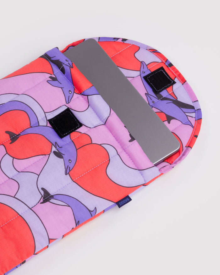 Quilted and puffy laptop sleeve with colourful dolpin design and velcro closure