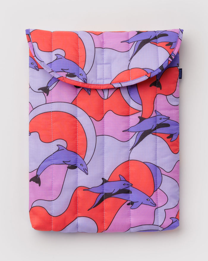 Foldable quilted and puffy laptop sleeve with colourful background and purple dolphin pattern.