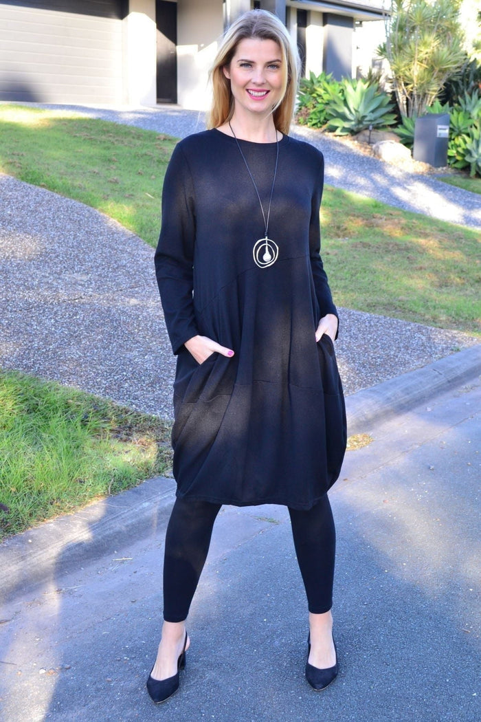 Black Cocoon Winter Pocket Tunic Dress by Peony, showcasing a cozy, stylish tunic with pockets and a relaxed fit.