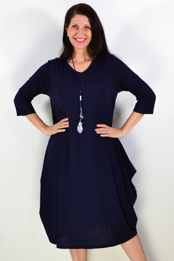 Black relaxed oversized tunic dress by Lilia Whispers, featuring a loose fit and casual style, shown on a model.