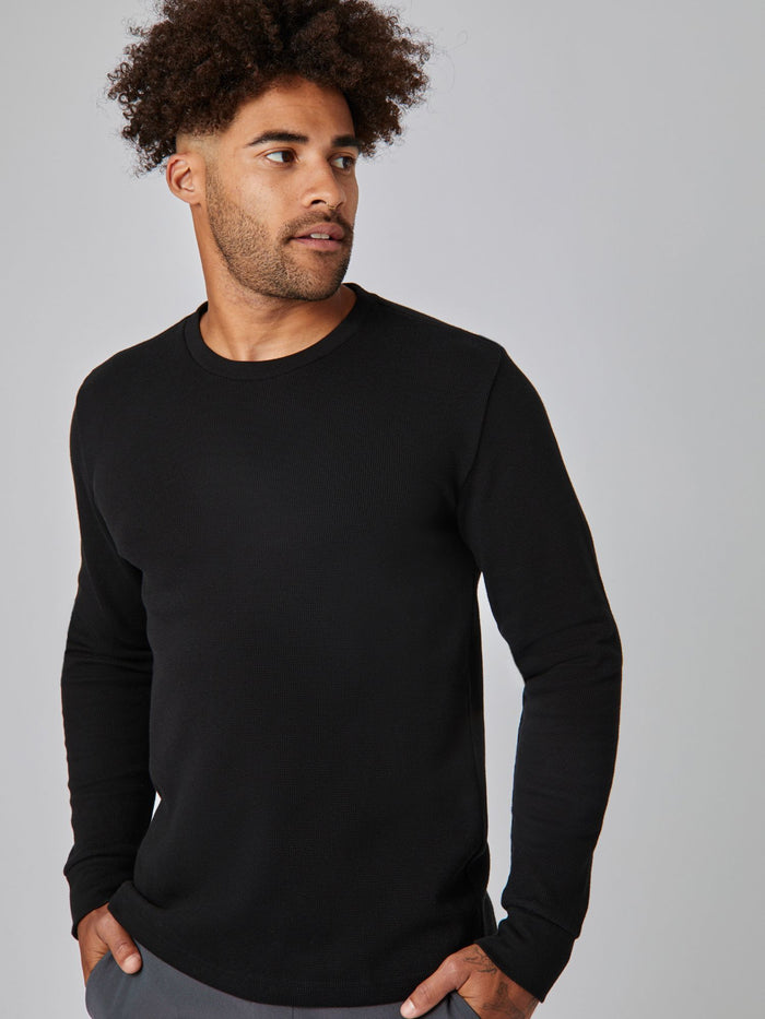 Joe is 6', 180LBS and wears a size L # Black Thermal Long Sleeve Crew Studio Image Angle | Model Size Large | Fresh Clean Threads