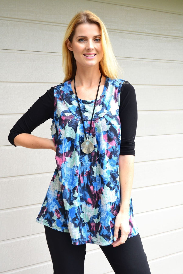 Blue maple leaf sleeveless fleece tunic top by Lilia Whispers, shown with a relaxed fit and cozy fleece fabric.