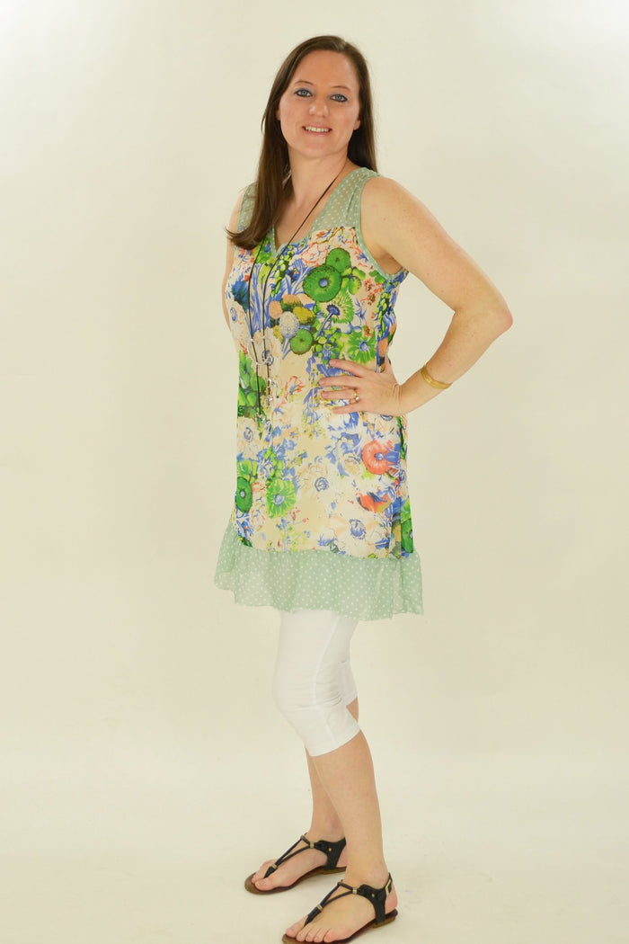 Blue Meadow Flowers Tunic by Whispers, featuring a flowing fabric with a vibrant floral pattern and relaxed fit.