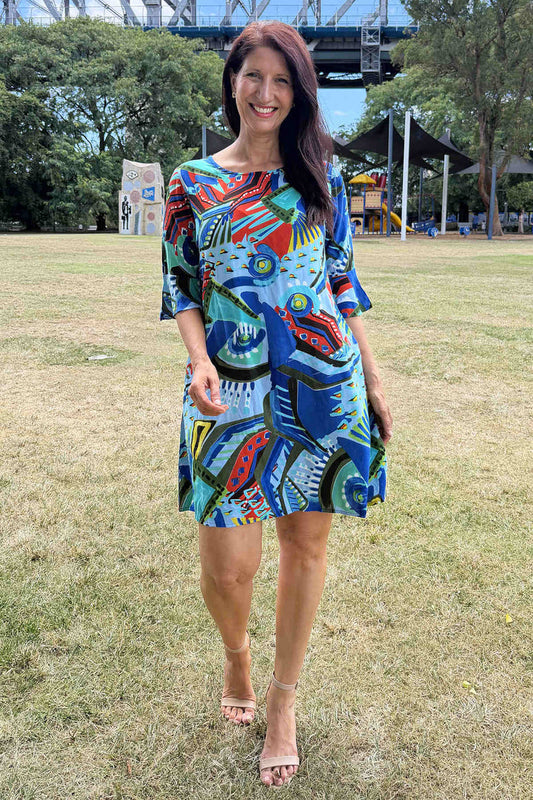 Blue and red tribal print summer tunic dress by Orientique, featuring lightweight fabric and casual, boho-inspired style.