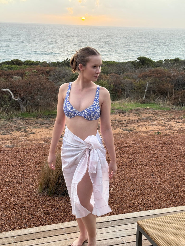 Woman wearing a pink and white checked Sarong tied at waist and bikini top - ANNIE.G