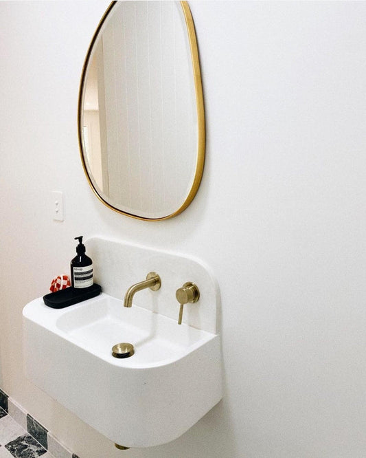 Riverstone Mirror in a bathroom