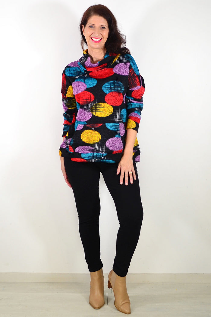 Colorful Orbs Ladies Cardigan by Wishstone, vibrant knit tunic with multicolored orb patterns, displayed on a hanger.
