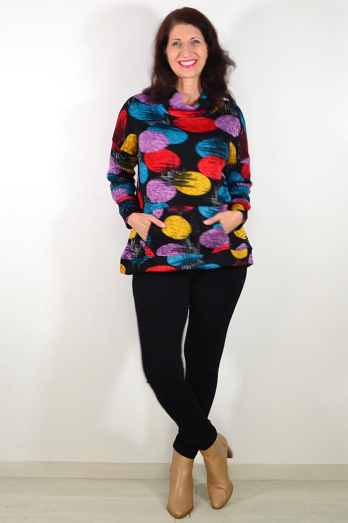 Colorful Orbs Ladies Cardigan, Wishstone tunic with vibrant, multicolored orb pattern, shown on a model.