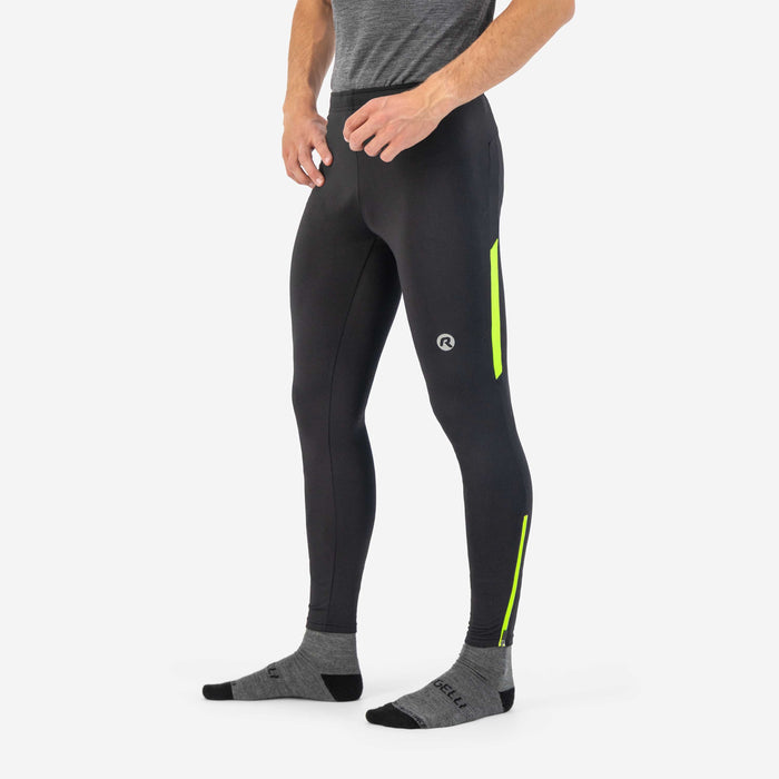 Rogelli Core lange gevoerde hardloopbroek heren zwart en geel gedragen voorkant.
