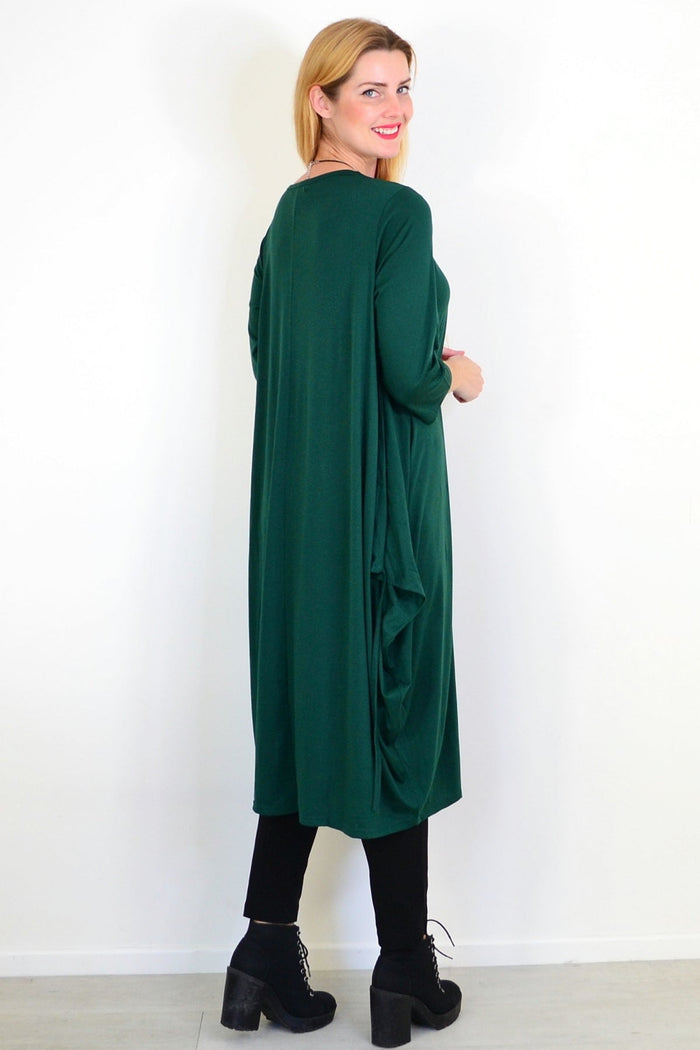 Dark green oversized tunic dress by Lilia Whispers, relaxed fit with long sleeves and a comfortable, flowing silhouette.