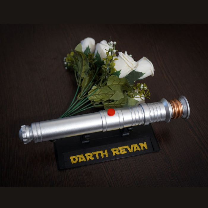 Star Wars themed wedding bouquet holder shaped like Darth Revan lightsaber hilt
