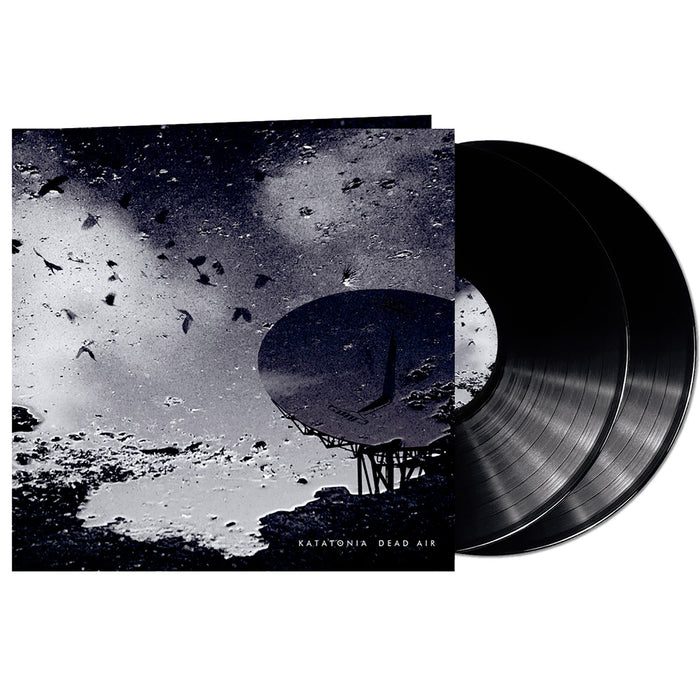 Katatonia’s "Dead Air" album cover shows a dark scene with a satellite dish, flying birds, and cloudy skies. Includes two black lockdown session vinyls reflecting the brand's progressive metallic rock vibe.