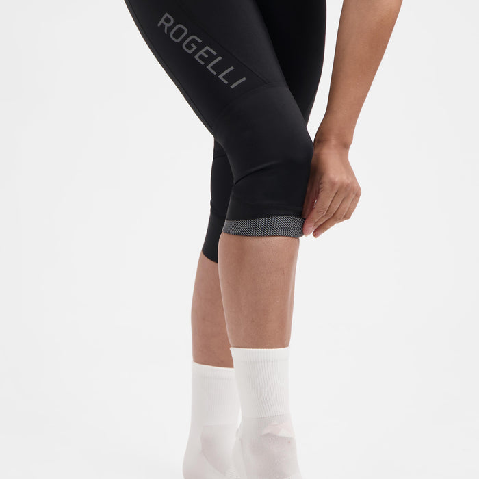 Detail van Rogelli Essential III driekwart fietsbroek dames zwart broekspijp.