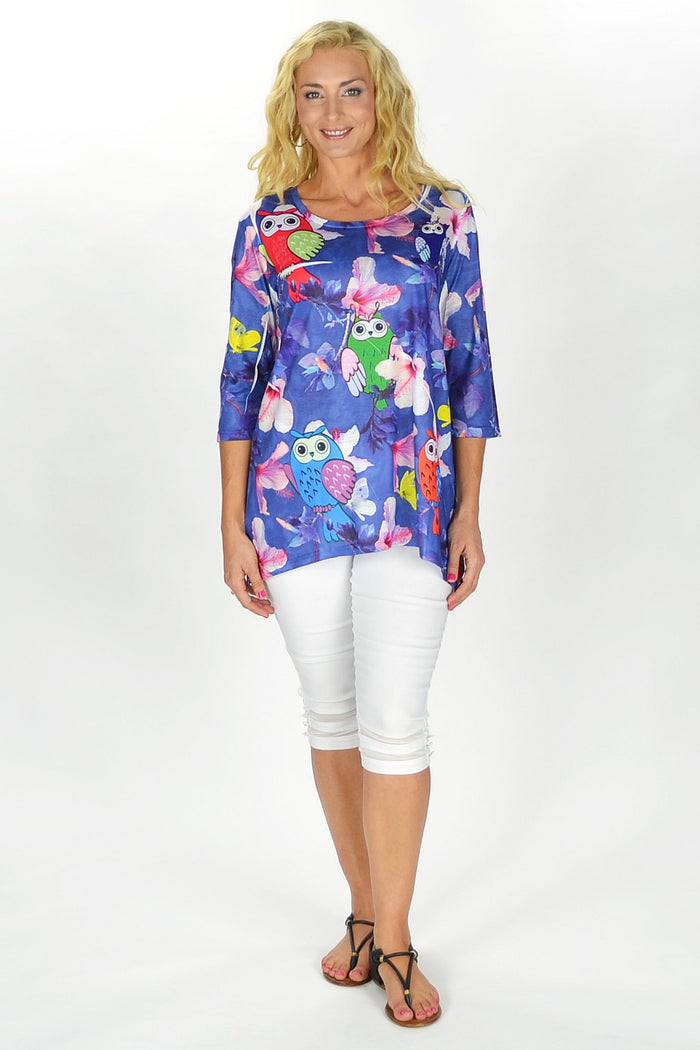 Flowers and owl print tunic by Fanny Lam featuring a colorful floral and owl pattern on lightweight fabric.