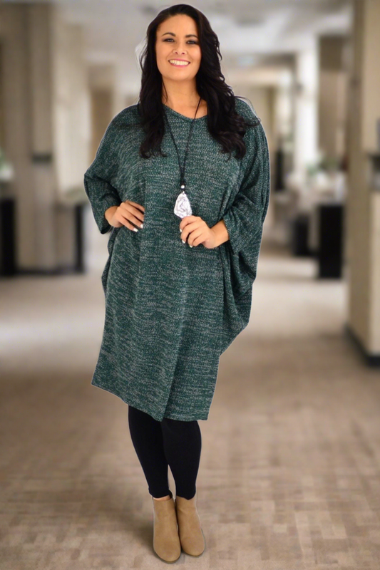 Forest green textured knit tunic dress by Lilia Whispers, featuring long sleeves and a cozy winter style.