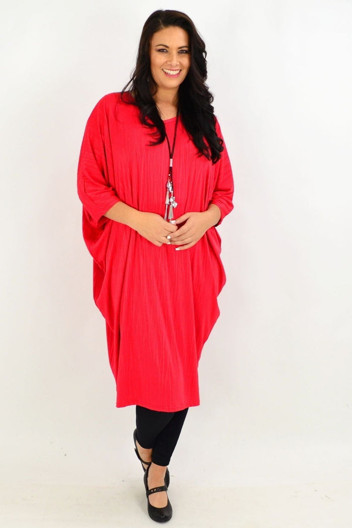 Red ribbed oversized tunic dress by Lilia Whispers, featuring a loose fit and casual style, shown on a model.