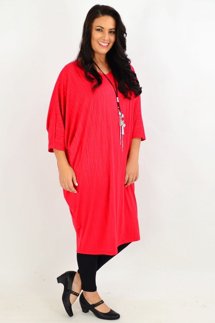 Red ribbed oversized tunic dress by Lilia Whispers featuring a loose fit and casual style, shown on a model.