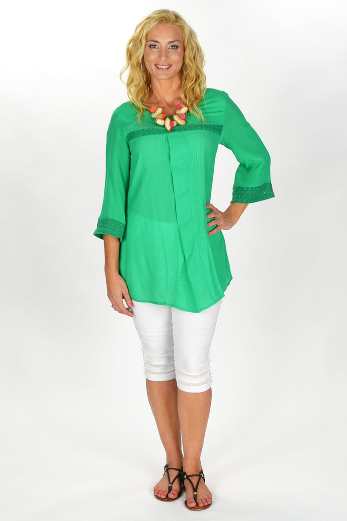 Green Goddess Tunic by David Jessie, showcasing a flowy, vibrant green tunic with a relaxed fit and intricate neckline details.