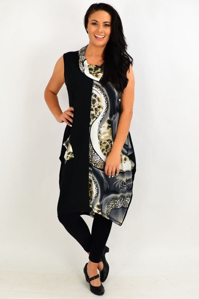 Grey leopard print sleeveless tunic dress by Whispers, showing a relaxed fit with animal print fabric and sleeveless design.