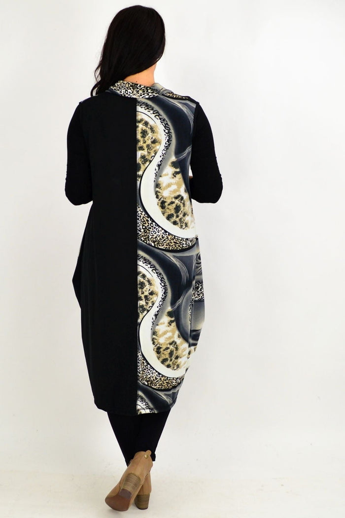 Grey leopard print sleeveless tunic dress by Whispers, showcasing the flowy fabric and stylish animal print design.