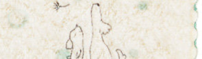 Two embroidered outlines of dogs on a cream washcloth with mint blue dot designs.