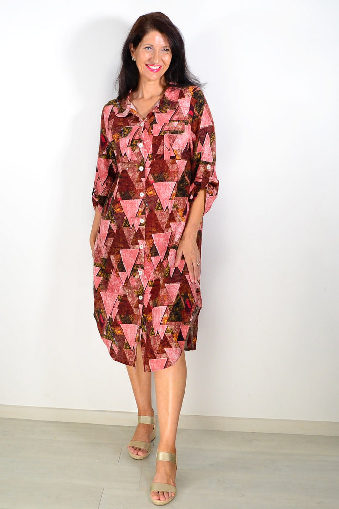 Ladies pink print long tunic shirt by Wishstone, featuring a stylish and comfortable design with a relaxed fit.