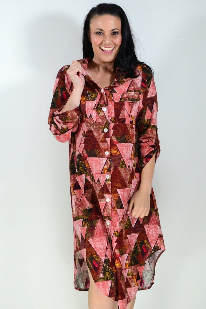 Pink printed ladies long tunic shirt by Wishstone, featuring a flowy silhouette and stylish design.