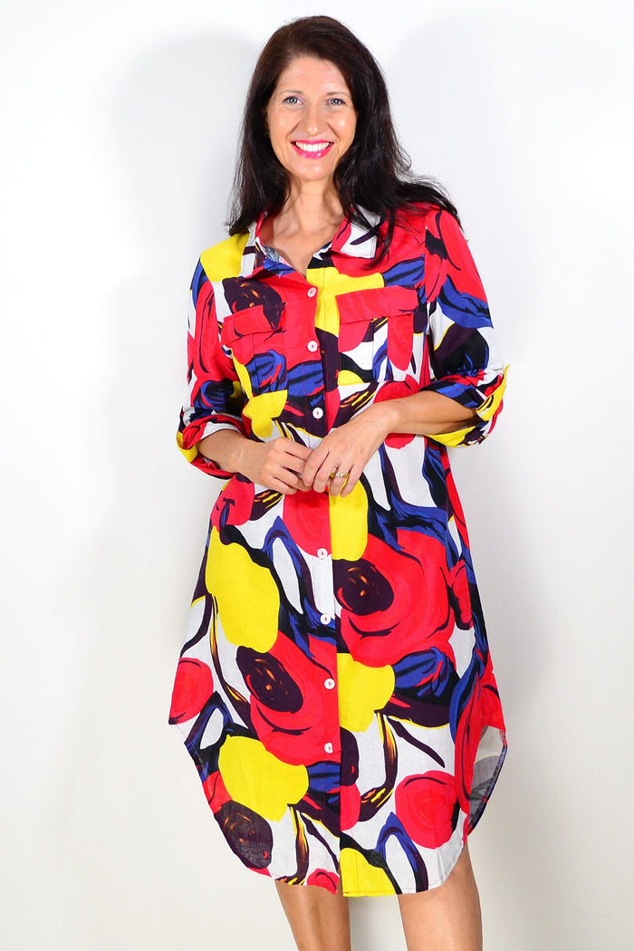 Red and yellow printed ladies long tunic shirt by Wishstone, featuring a flowy design and vibrant floral pattern.