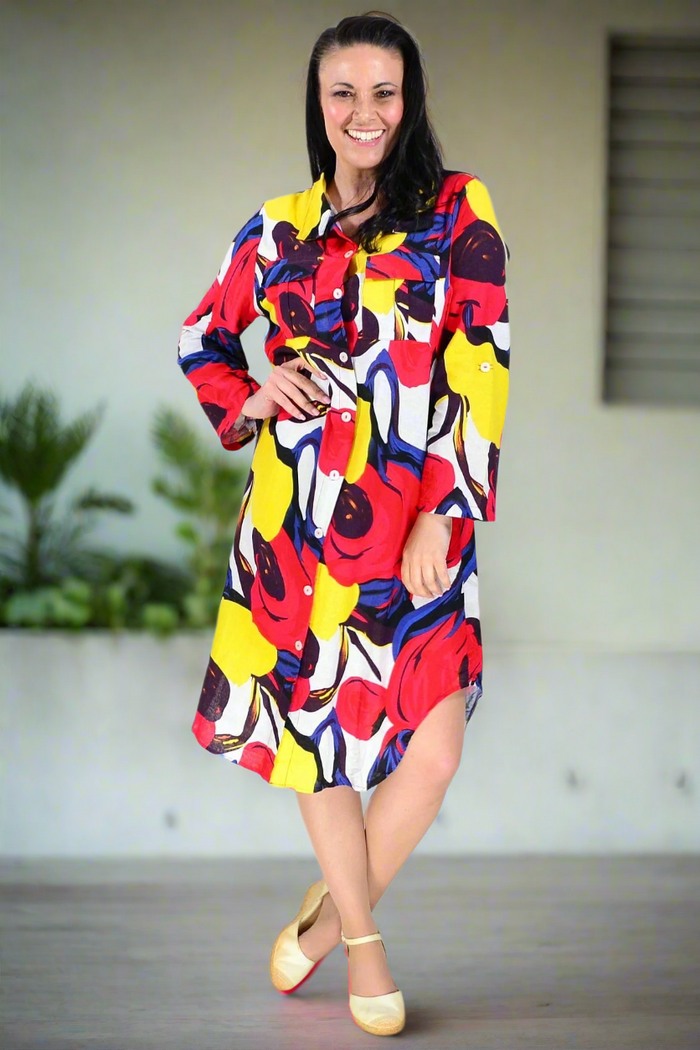 Red and yellow printed ladies long tunic shirt by Wishstone, featuring a stylish, flowing design with long sleeves and vibrant pattern.