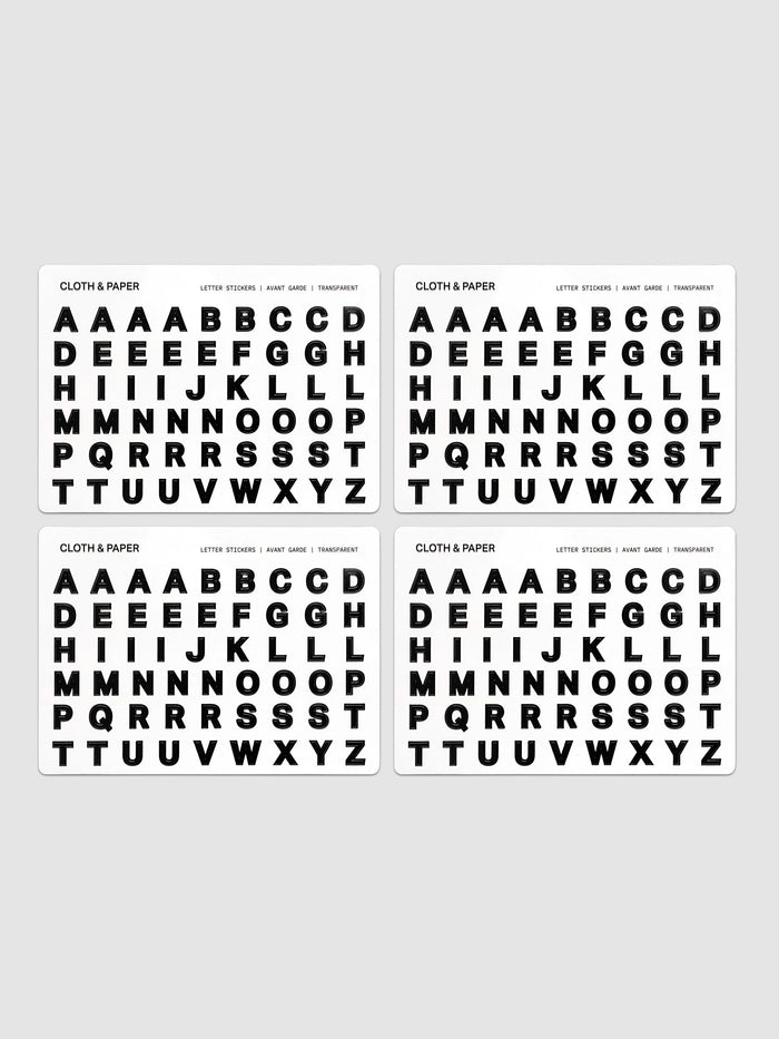 Letter Stickers Transparent, four-sheet set fanned out showing full A–Z alphabet in bold black letters on clear backing