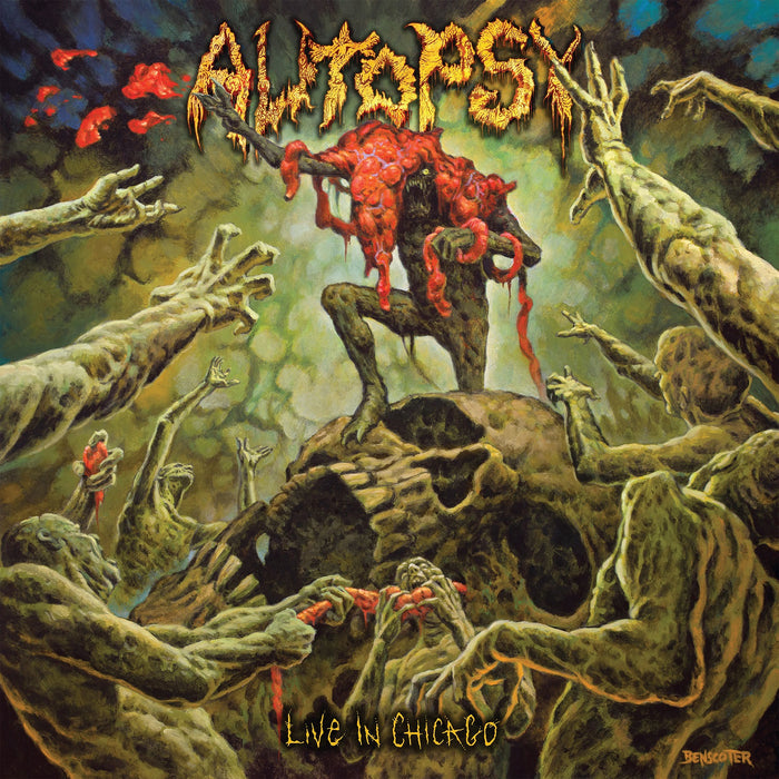 A grotesque, zombie-like figure stands on a giant skull, holding entrails above its head as decaying hands reach up. The band name Autopsy and the live album title Live in Chicago are displayed. Brand Name: Autopsy.