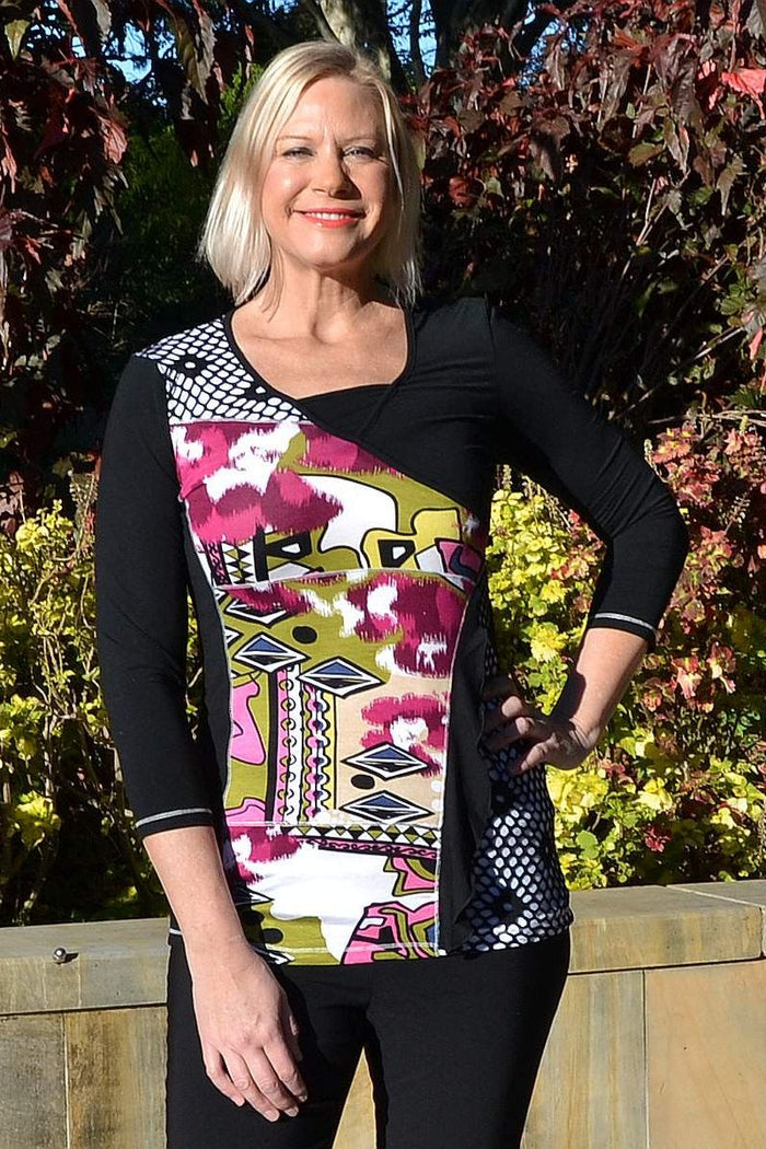 Jenny May Louise tunic top displayed on a hanger, featuring a relaxed fit and stylish design perfect for casual wear.