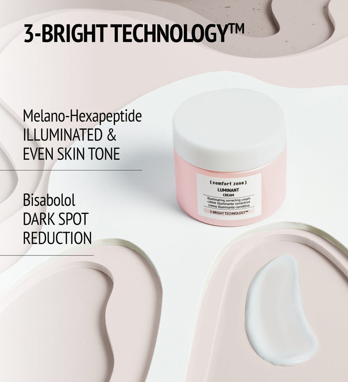 Luminant Cream | [ comfort zone ] jar with white cream swatch on a sculpted beige surface highlighting 3-Bright Technology for illuminated, even skin tone and dark spot reduction skincare benefits.